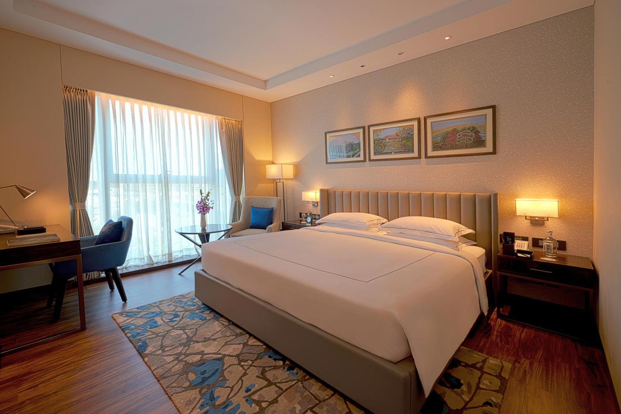Taj Bangalore Devanahalli Екстериор снимка A bedroom at the Taj Bengal